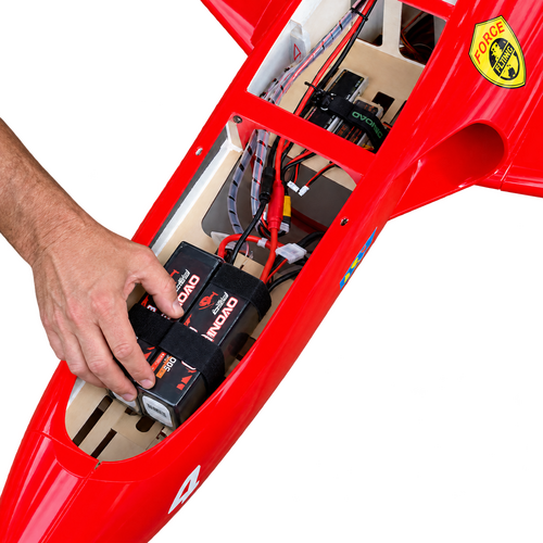 Experienced RC pilot securing batteries inside an HSD aircraft